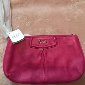 Hot pink Coach wristlet